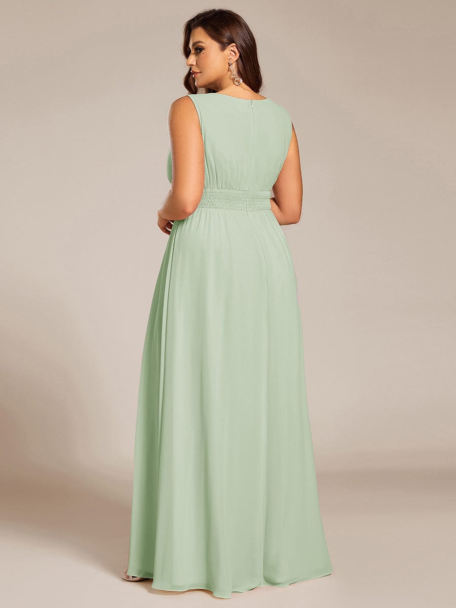 A-Line Chiffon Bridesmaid Dress with Sleeveless Round Neckline and Pleats #color_Mint Green