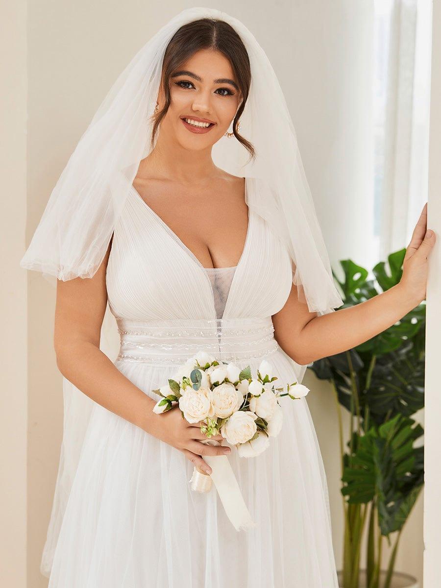 Sleeveless Deep V Low Back Long Wedding Dress #color_Ivory