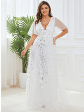 Plus Size romantic shimmery v neck ruffle sleeves evening gown #color_White